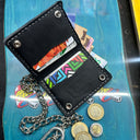 Cartera Wild de Piel Negra con Hilos Blancos