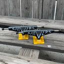 Trucks Shivers Letras Negro Amarillo 149mm