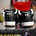Tenis Globe Tilt Black White Stitch